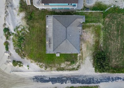 841 Buell Street, Crystal Beach, Texas, 77650, Owner Edward White, Photographed in the morning. Located on the Gulf of America. The house has 3 bedrooms, 2 full baths, laundry room, kitchen, living room dining room, deck, parking area underneath, downstairs shower and view of the beach and Gulf.