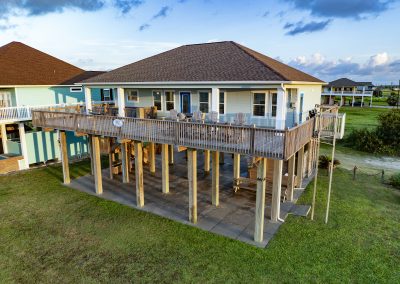 841 Buell Street, Crystal Beach, Texas, 77650, Owner Edward White, Photographed in the morning. Located on the Gulf of America. The house has 3 bedrooms, 2 full baths, laundry room, kitchen, living room dining room, deck, parking area underneath, downstairs shower and view of the beach and Gulf.