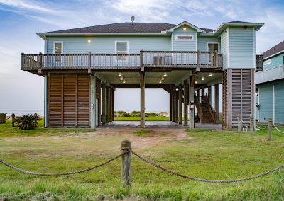 841 Buell Street, Crystal Beach, Texas, 77650, Owner Edward White, Photographed in the morning. Located on the Gulf of America. The house has 3 bedrooms, 2 full baths, laundry room, kitchen, living room dining room, deck, parking area underneath, downstairs shower and view of the beach and Gulf.