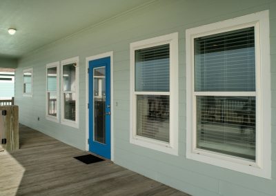 841 Buell Street, Crystal Beach, Texas, 77650, Owner Edward White, Photographed in the morning. Located on the Gulf of America. The house has 3 bedrooms, 2 full baths, laundry room, kitchen, living room dining room, deck, parking area underneath, downstairs shower and view of the beach and Gulf.